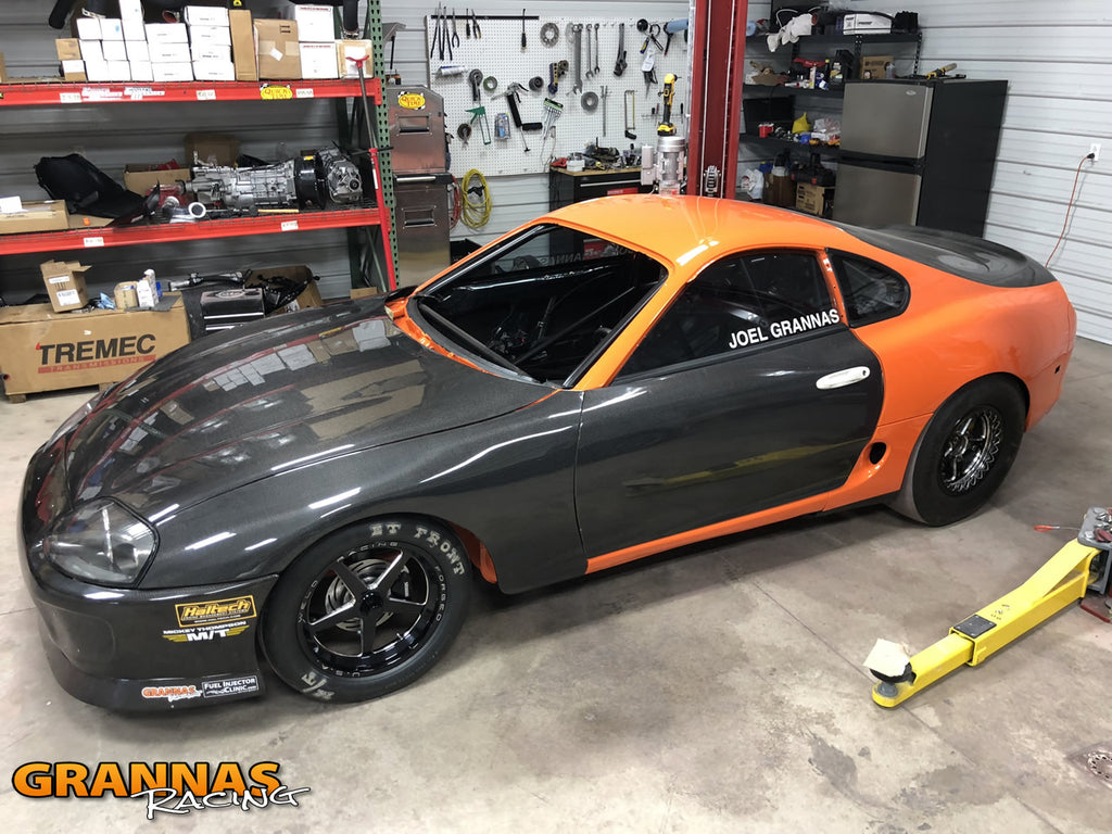 Orange and carbon fiber MKIV Supra drag chassis - what 6speed Dreams are made of...